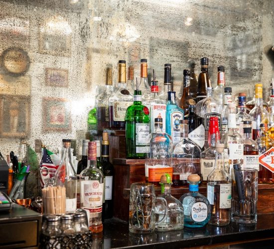 A wall of drinks during happy hour at Finnegan's